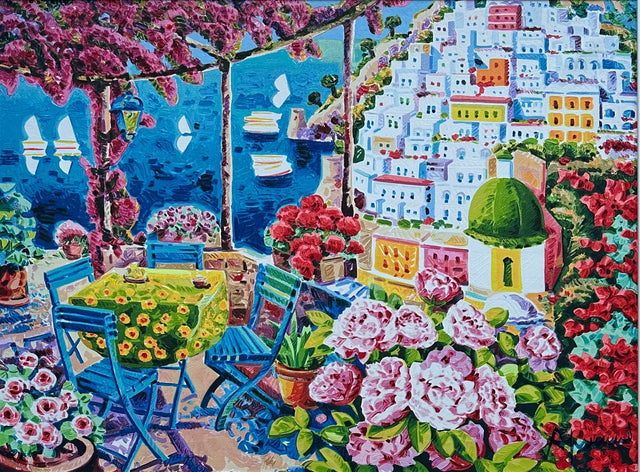 Opera incorniciata: Le sedie azzurre nella luce di Positano  | Athos Faccincani